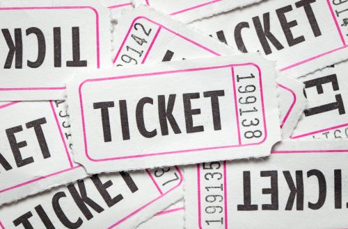 Multiple white color paper show tickets in pile